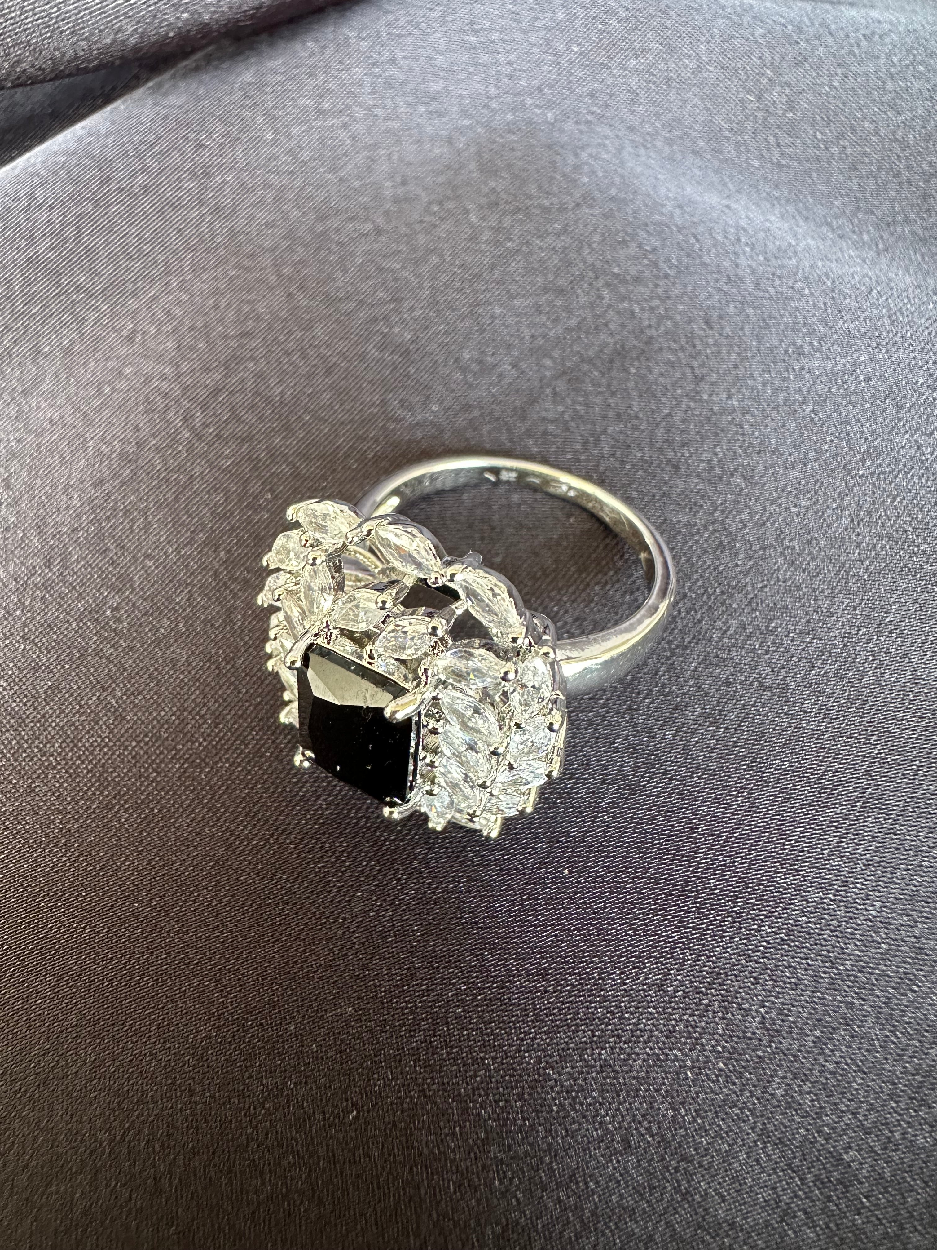 Black halo silver ring